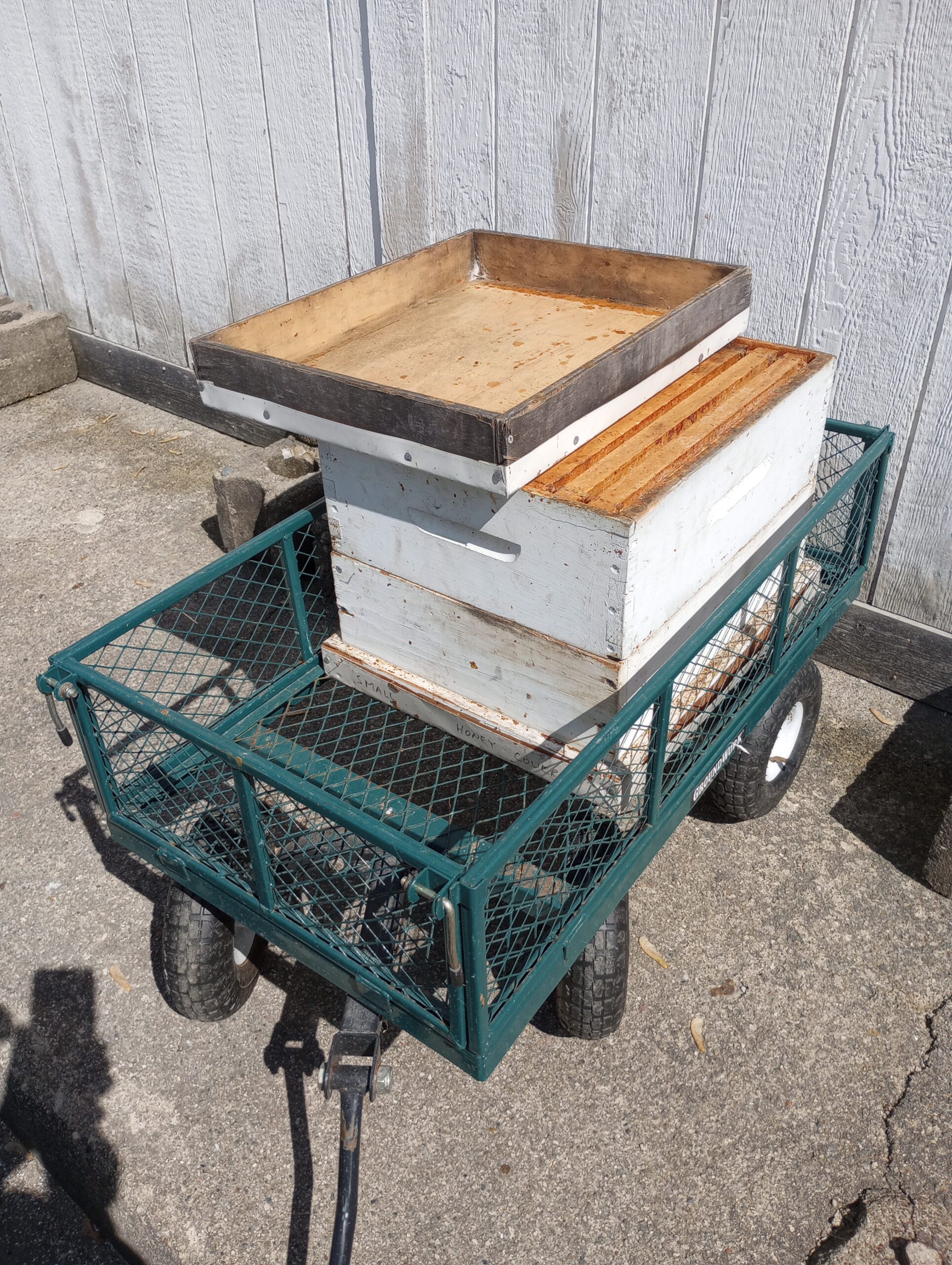 Collecting honey supers in a moveable wagon allows easy delivery to the extraction location. Photo Credit: Richard Wahl.
