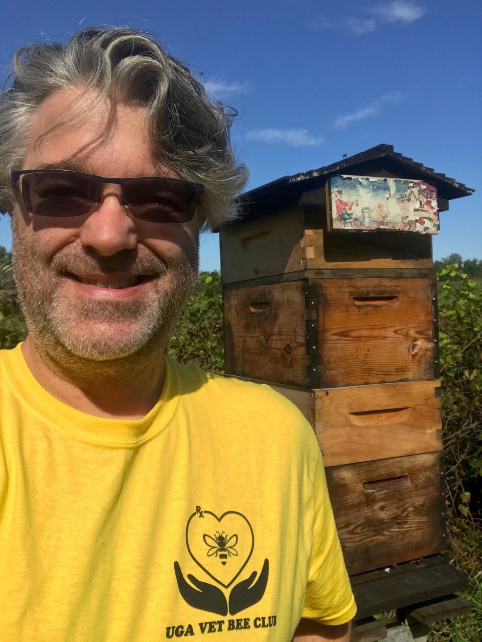 Joerg and his hive. Credit: Joerg Mayer.