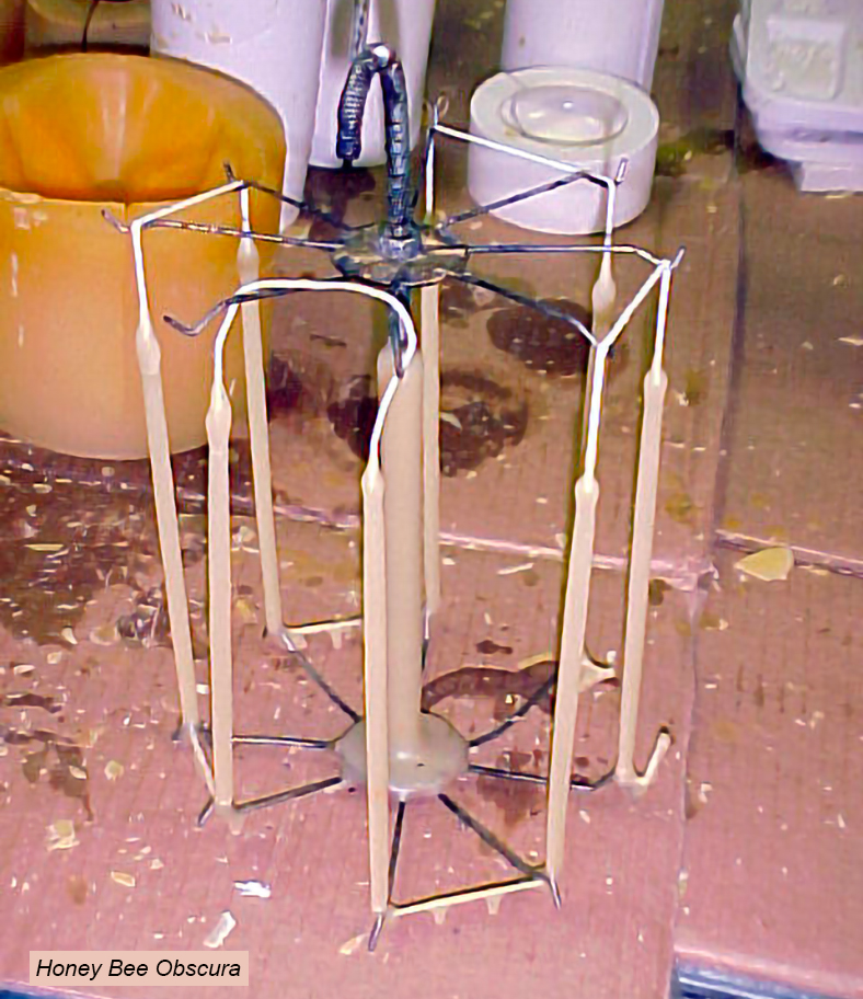 Figure 5. A shop-built jig for dipping eight candle tapers at once.