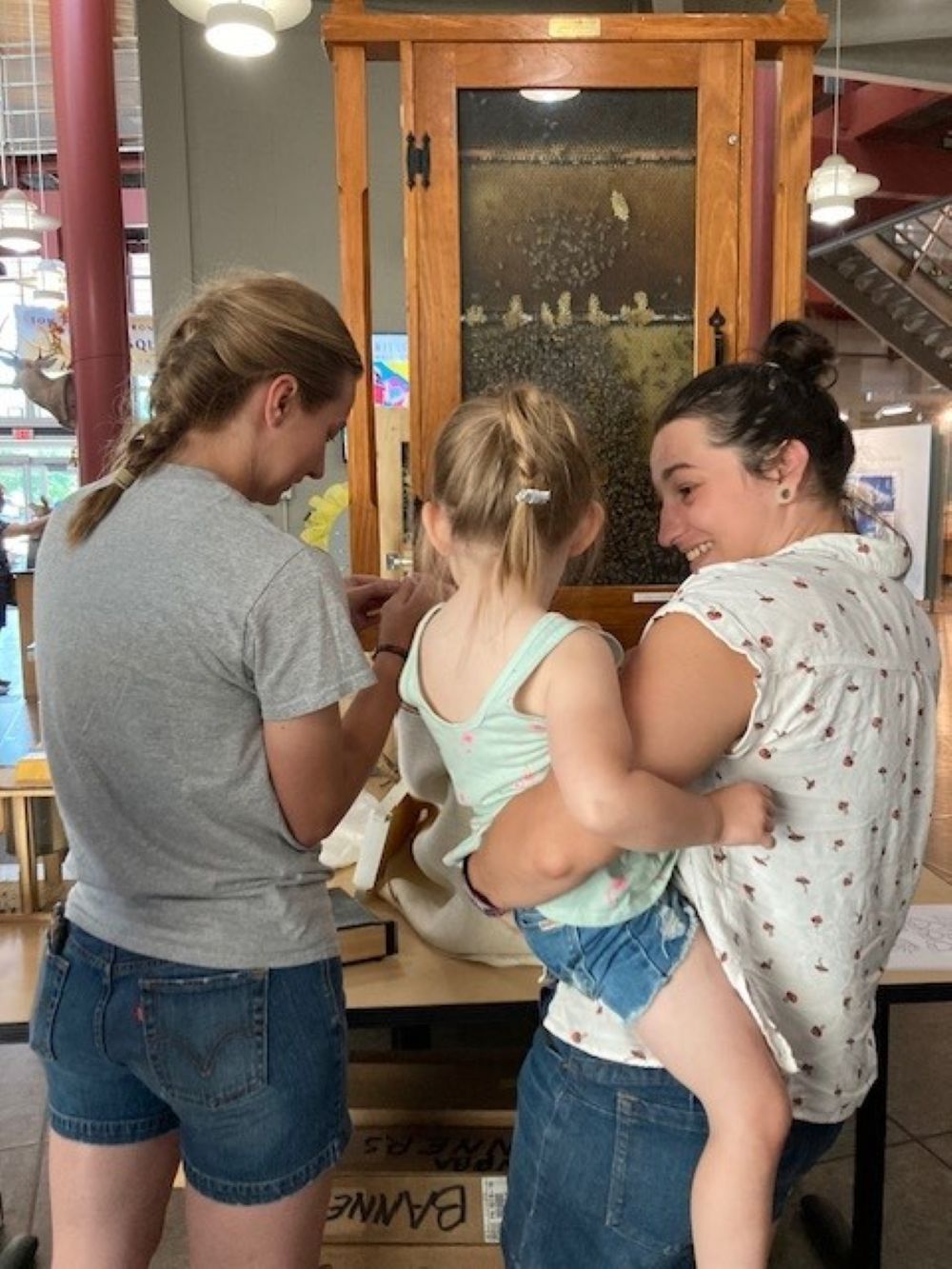 Students showing the next generation the world of beekeeping.